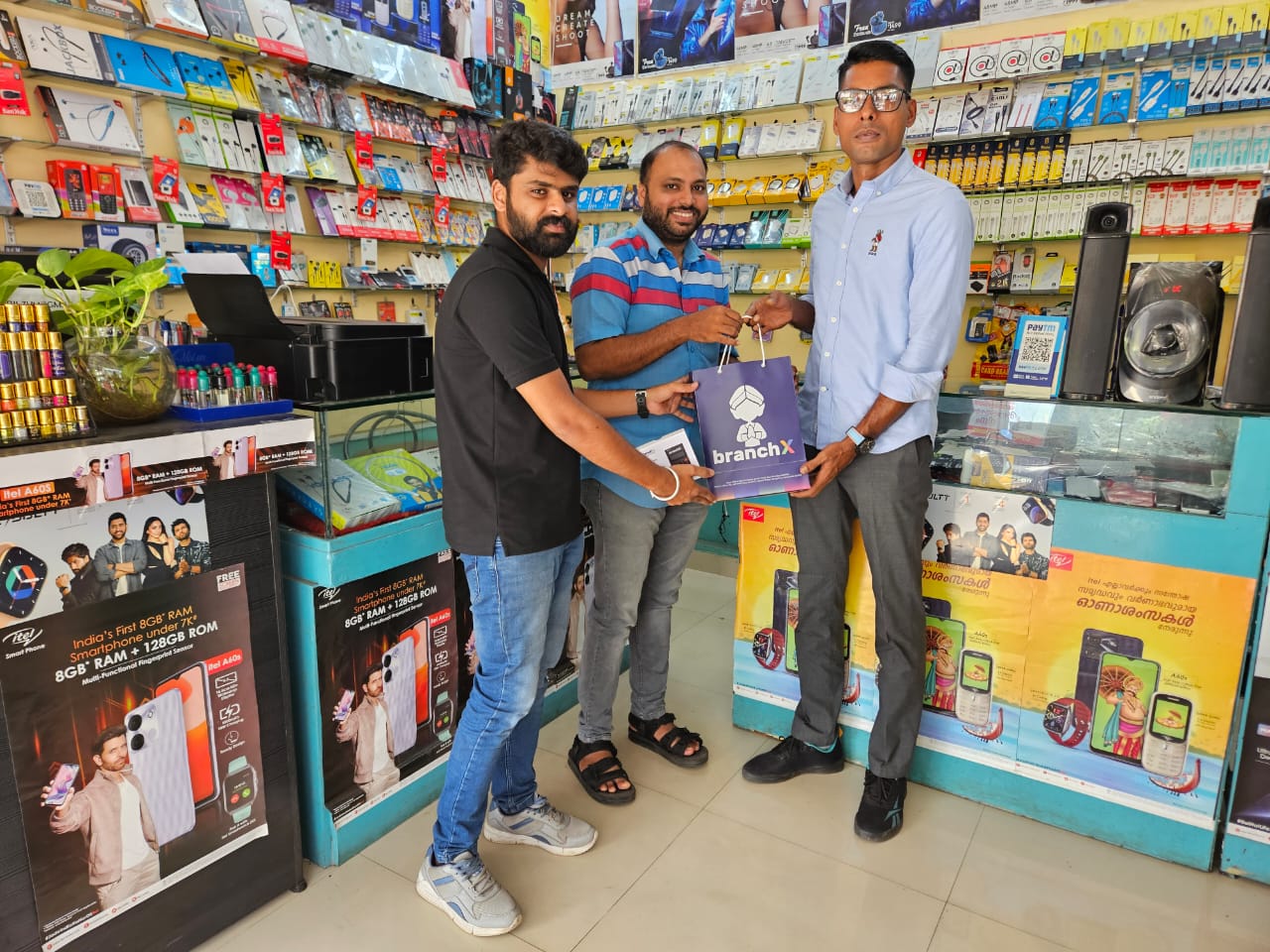 BranchX team onboarding a mobile accessories retailer in store