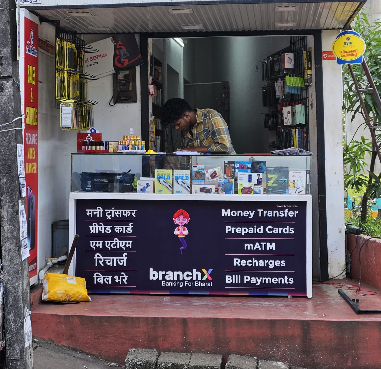 BranchX counter branding at a mobile sales and service shop